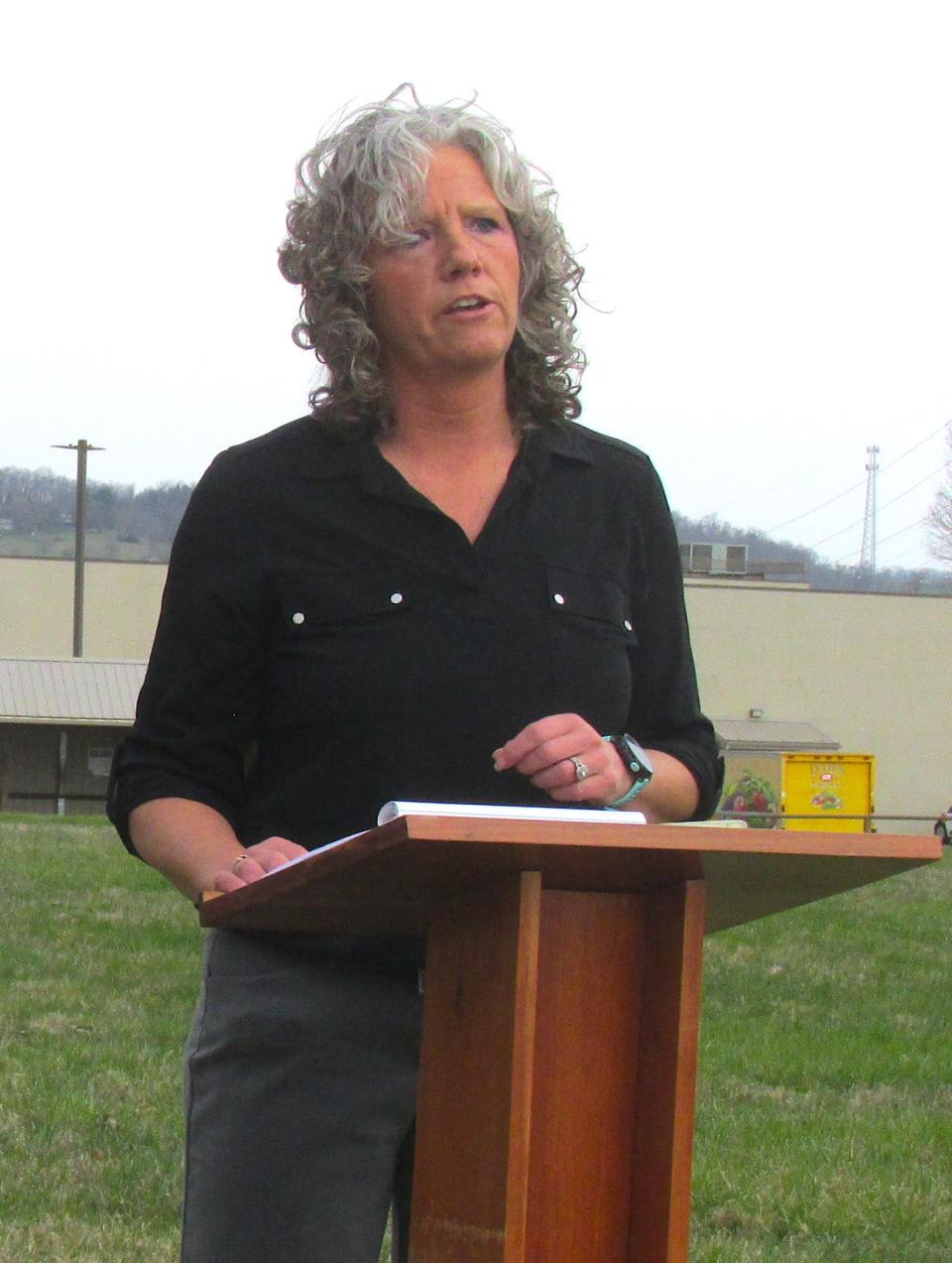 Holmes County Health District Board President Misty Burns addresses the crowd gathered for the groundbreaking of the new Health District building on Glen Drive in Millersburg.