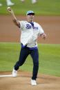 Dallas Mavericks coach Jason Kidd throws out the ceremonial first pitch before a baseball game between the Texas Rangers and the Arizona Diamondbacks in Arlington, Texas, Tuesday, July 27, 2021. (AP Photo/Tony Gutierrez)