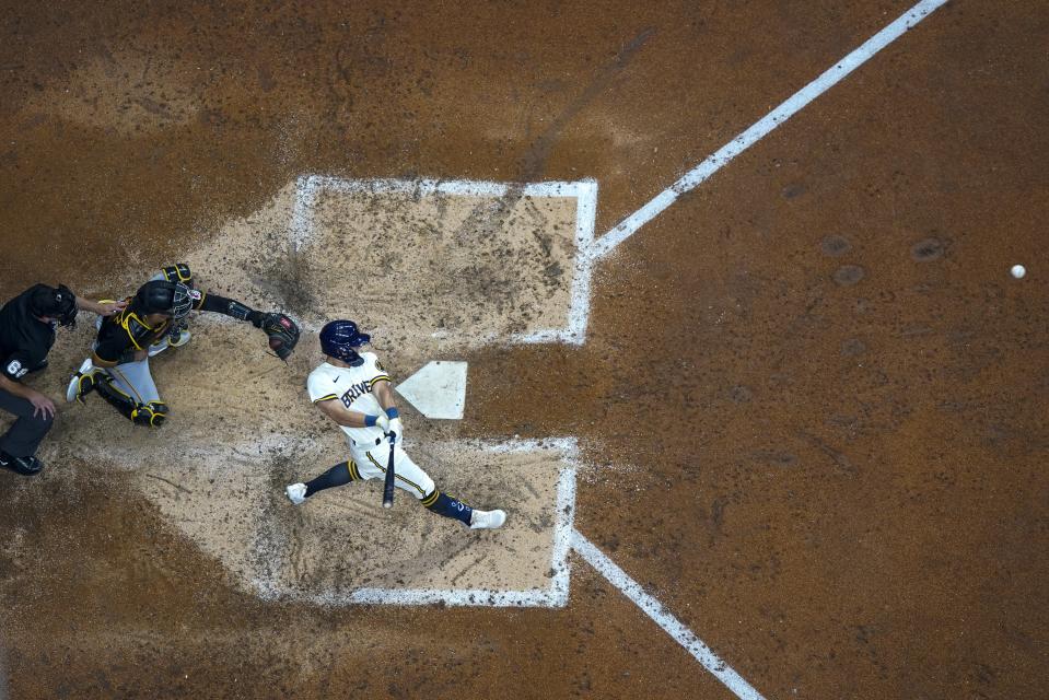 Milwaukee Brewers' Sal Frelick hits a three-run home run during the sixth inning of a baseball game against the Pittsburgh Pirates Thursday, Aug. 3, 2023, in Milwaukee. (AP Photo/Morry Gash)