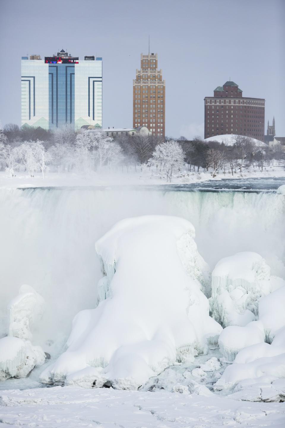 A partially frozen American Falls is seen from Niagara Falls Ontario