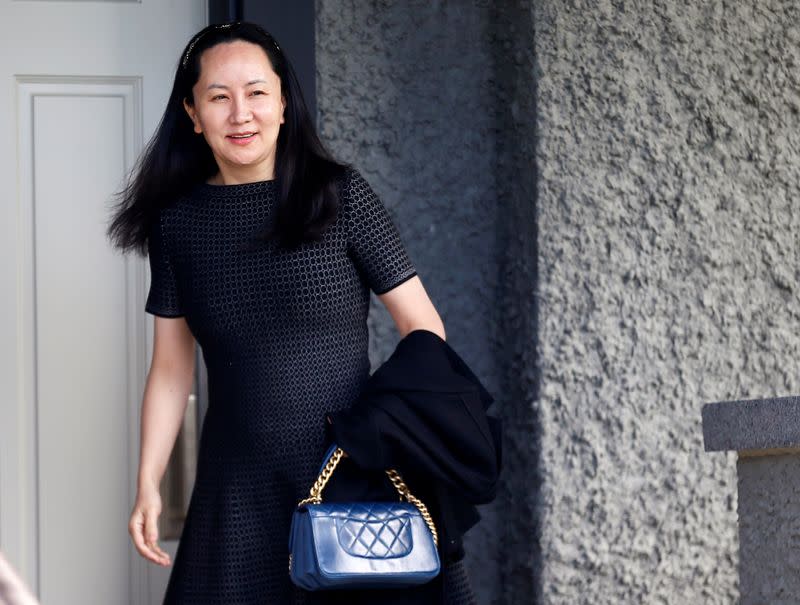 FILE PHOTO: Huawei's Financial Chief Meng Wanzhou leaves her family home in Vancouver, British Columbia