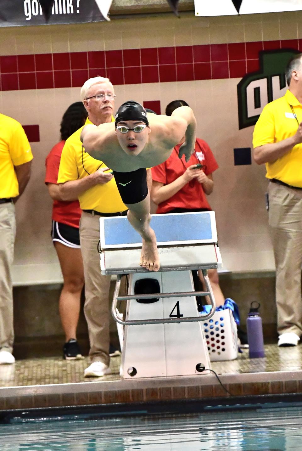 Jason Zhao of Indian Hill leaps off the block on his way to a state record-breaking swim in the boys 500-yard freestyle at the 2023 Division II Ohio High School Athletic Association Swimming and Diving Championships, Feb. 23-24, 2023.