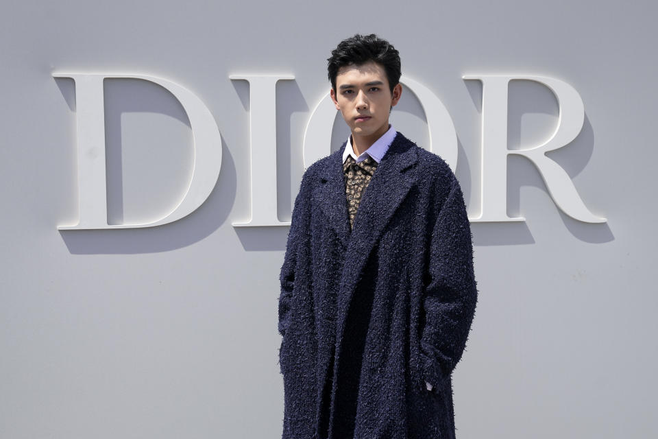 Arthur Chen poses for photographers upon arrival at the Dior Menswear Spring/Summer 2024 fashion collection presented in Paris, Friday, June 23, 2023. (AP Photo/Michel Euler)