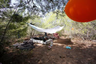 African migrants rest in a makeshift camp in a hiding place in the Moroccan mountains near the city of Tangier, Morocco September 6, 2018. REUTERS/Youssef Boudlal