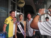 Reigning beauty queen May Hsu poses with guests. (Yahoo! Singapore/ Deborah Choo)