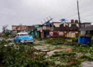 <p>A wide photo shows debris and devastation in Pinar del Rio, Cuba, on Sept. 27.</p>