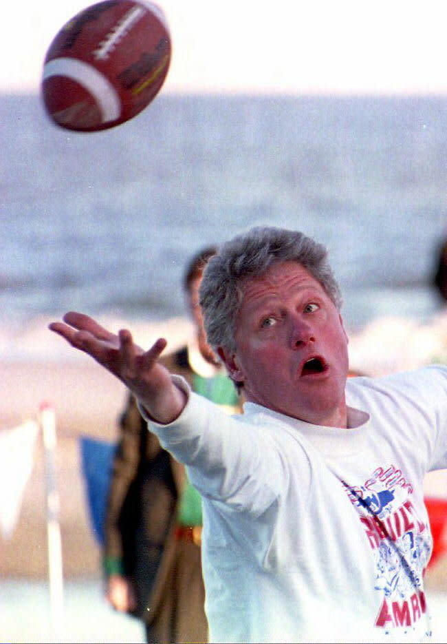 Clinton was <em>really</em> into the game on Hilton Head on New Year's Eve 1993.  (ROBERT GIROUX/AFP/Getty Images)