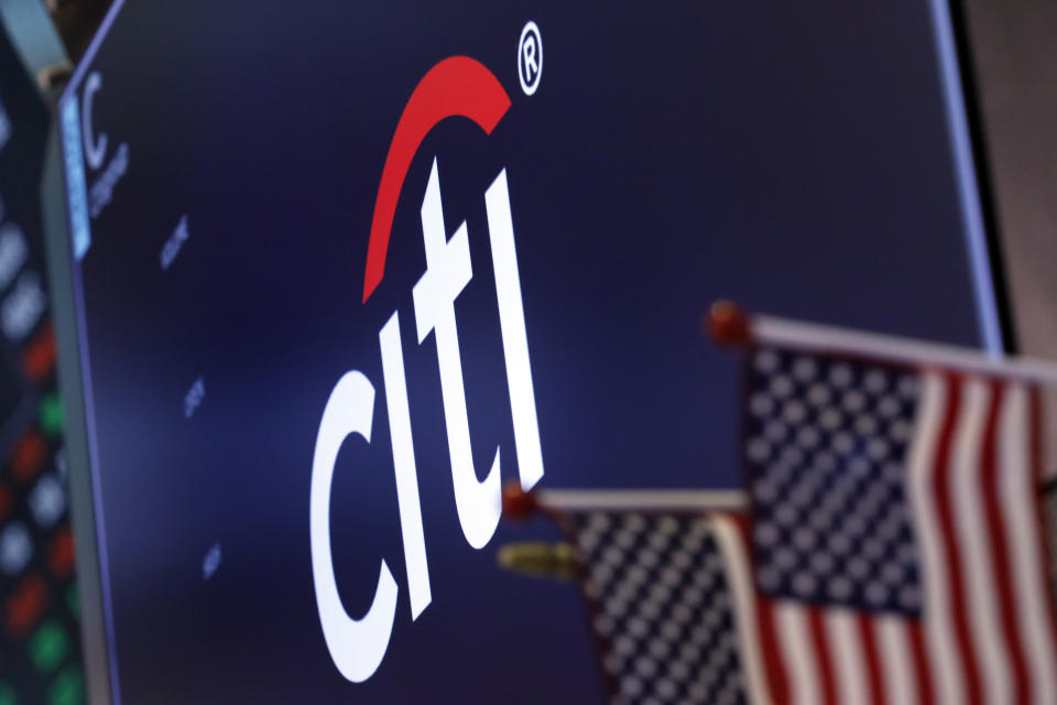 FILE - In this Feb. 8, 2019, file photo, the logo for Citigroup appears above a trading post on the floor of the New York Stock Exchange. Citigroup’s fourth-quarter profits rose by 15% from a year earlier, as the bank benefited from a boost in trading similar to its competitor JPMorgan Chase. Citi said Tuesday, Jan. 14, 2020, that bond trading revenues were up 49% from a year earlier, when a steep downfall in the last quarter of 2018 took its toll on all banks’ trading desks. (AP Photo/Richard Drew, File)