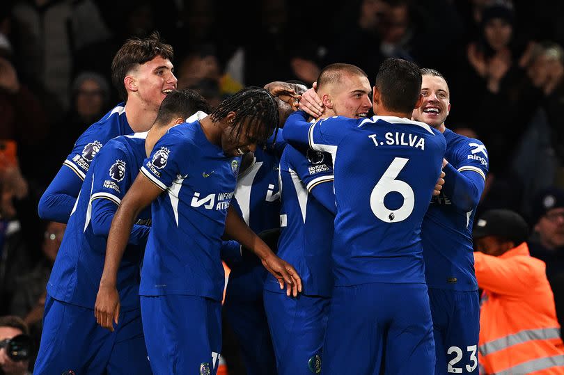 Chelsea players celebrate against Everton