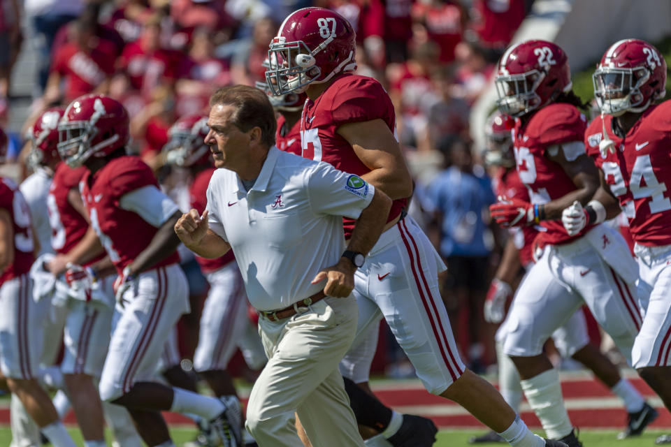 FILE - In this Sept. 28. 2019, file photo, Alabama coach Nick Saban leads the team onto the field before an NCAA college football game against Mississippi in Tuscaloosa, Ala. The Alabama football team released an emotional video Thursday, June 25, 2020, speaking out against racism and ending with the message that “all lives can’t matter until Black lives matter.” Saban and many prominent players, both Black and white, appear in the video that was written by Alabama left tackle Alex Leatherwood. (AP Photo/Vasha Hunt, File)