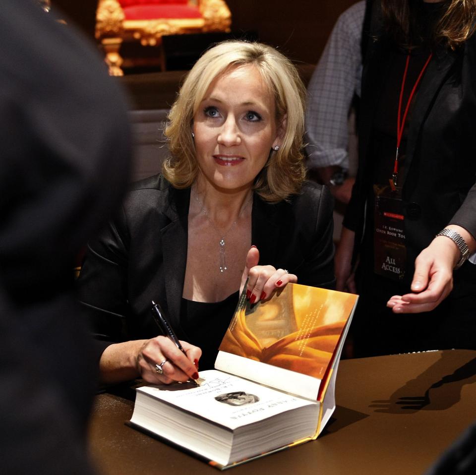 Author J.K. Rowling signs copies of her book "Harry Potter and the Deathly Hallows" in this Oct. 19, 2007, file photo during the final stop on the "J.K. Rowling Open Book Tour" held at Carnegie Hall in New York City.