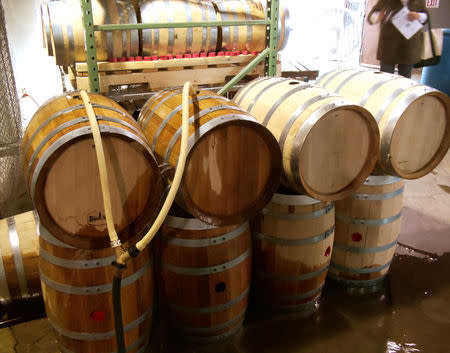 FILE PHOTO: Barrels are prepared for usage at the Corsair Artisan Distillery in Nashville, Tennessee May 9, 2011. REUTERS/Martinne Geller/File Photo