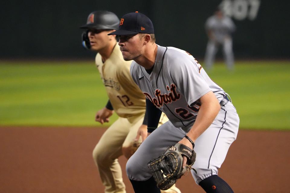 Jun 24, 2022; Phoenix, Arizona, USA; Detroit Tigers first baseman Spencer Torkelson (20) covers the bag as Arizona Diamondbacks right fielder Daulton Varsho (12) leads during the first inning at Chase Field.