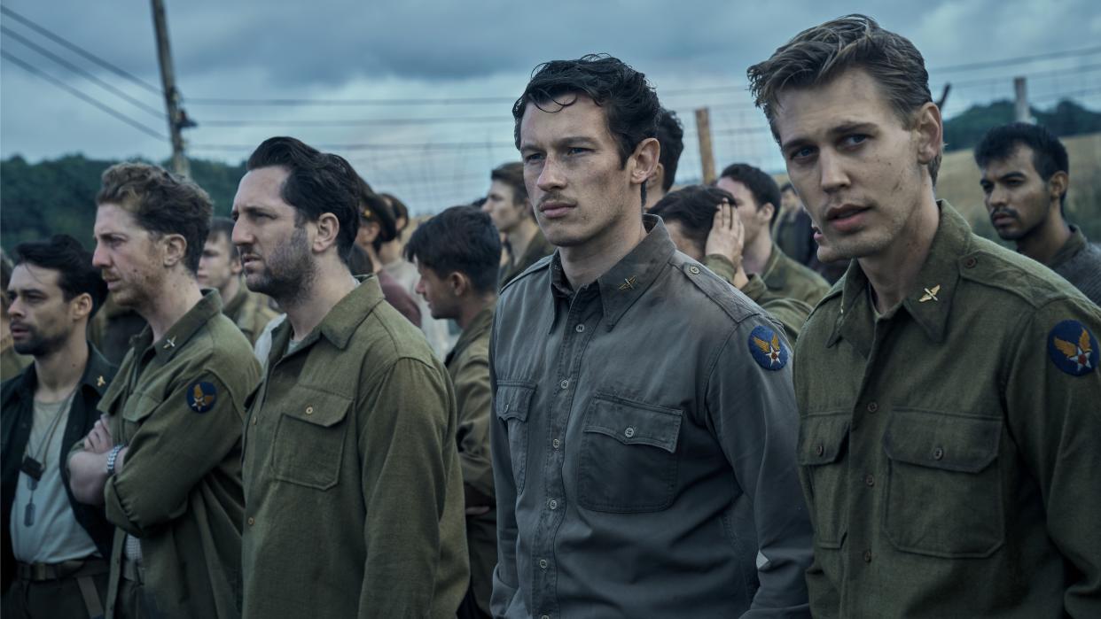  Adam Long, Matt Gavan, Callum Turner and Austin Butler standing side-by-side (L-R) as seen in the Apple TV Plus Original, Masters of the Air. 