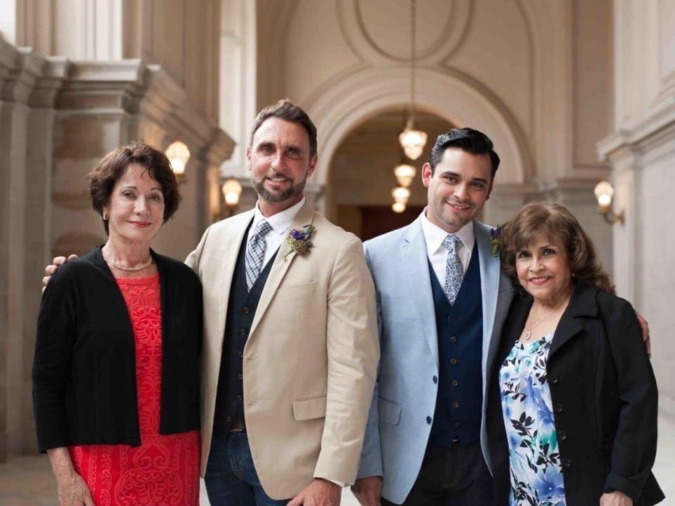 Flight attendant Anthony Cataldo and his husband Martin Ortiz-Cataldo alongside their mothers, whom they both take care of.