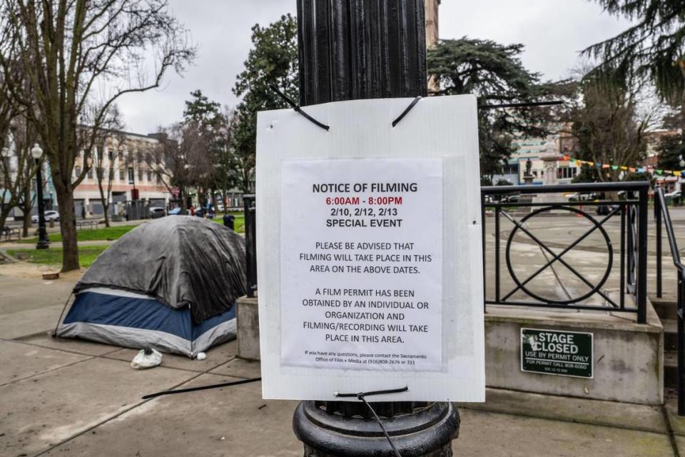 A sign advises the public on Thursday that filming will take place at Cesar Chavez Plaza in Sacramento starting on Saturday.