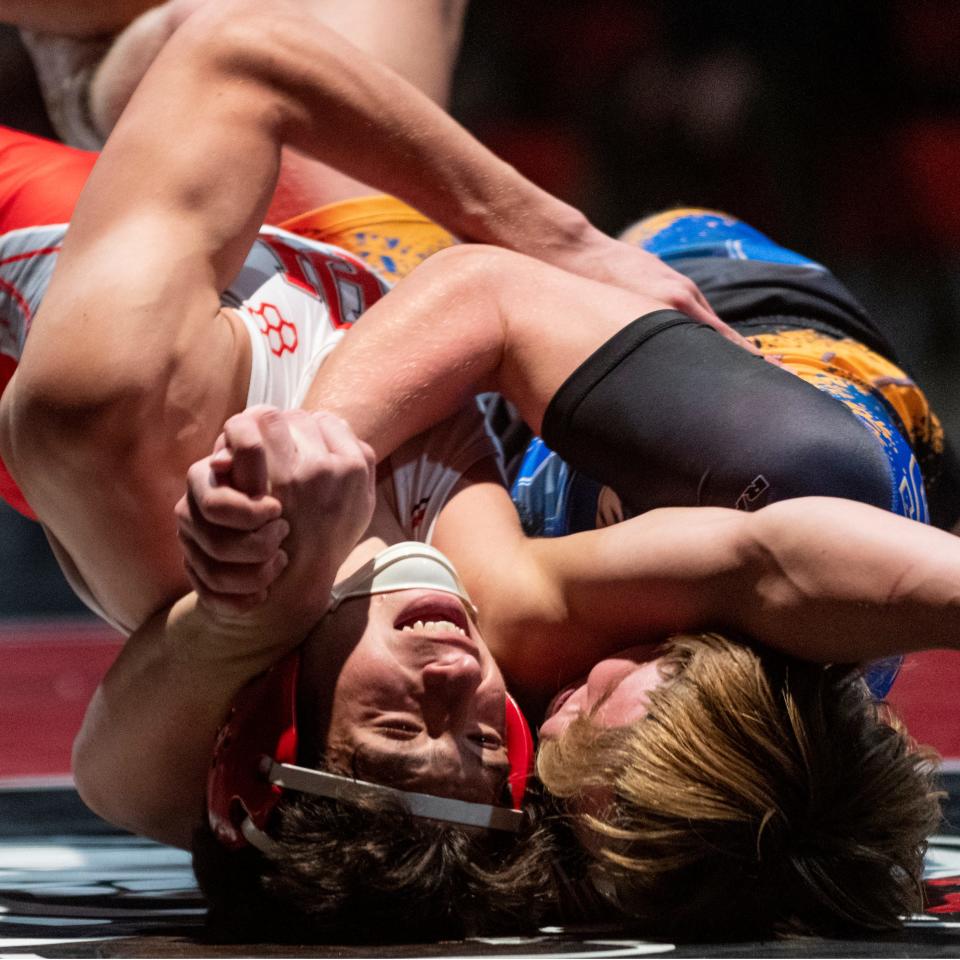 Oak Hills' Shea Gabriel is pinned by Serrano's Blake Chaffee during their 170-pound match on Thursday, Jan. 20, 2022.