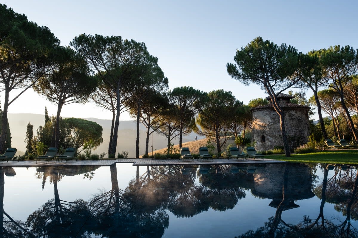 With the pools these hotels have to offer, you don’t need to book a beach getaway for waterside lounging on holiday (Castello di Reschio)