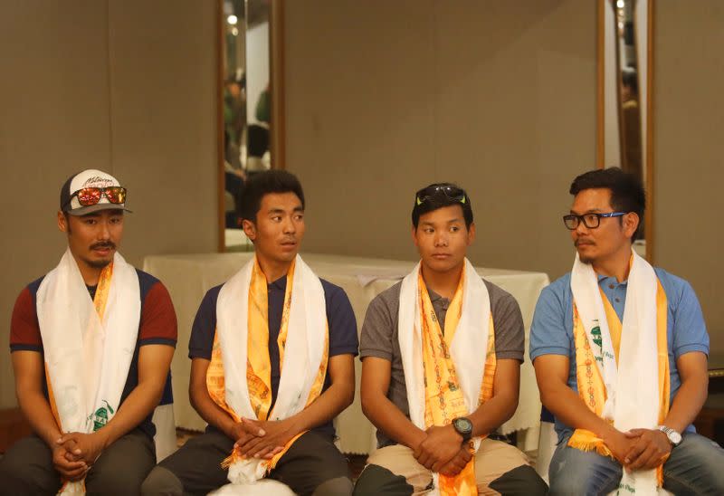 Halung Dorchi Sherpa, Pasang Nurbu Sherpa, Ming Temba Sherpa and Tashi Lakpa Sherpa attend a news conference organised before heading to attempt the record for the winter Everest expedition in 5 days, in Kathmandu