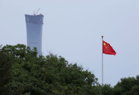 A Chinese flag flutters at Tiananmen Square in central Beijing, China June 8, 2018. REUTERS/Jason Lee/Files