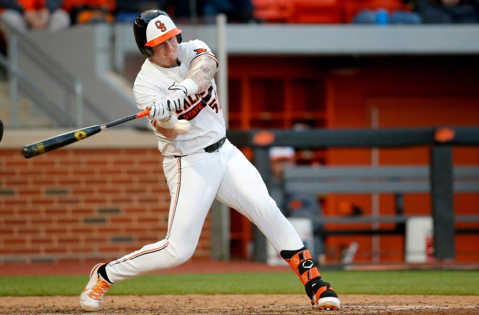 OSU's Griffin Doersching (52) hits a double in the fifth inning against OU on April 8 at O'Brate Stadium at Stillwater.