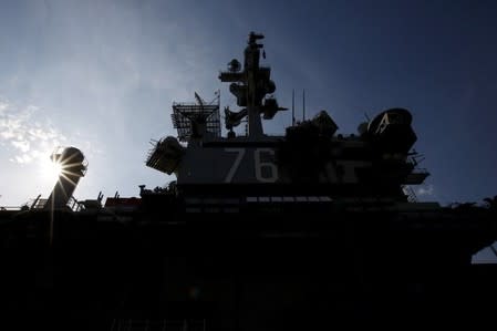 USS Ronald Reagan, a Nimitz-class nuclear-powered super carrier and the flagship of Carrier Strike Group Five in the part of the United States Seventh Fleet, is seen at the U.S. naval base in Yokosuka, south of Tokyo, Japan, January 8, 2016 file photo. REUTERS/Issei Kato/Files