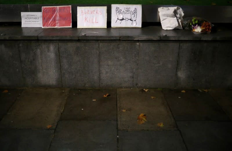 Anti-racism campaigners take part in a vigil, following the discovery of 39 bodies in a truck container, outside the Home Office in London