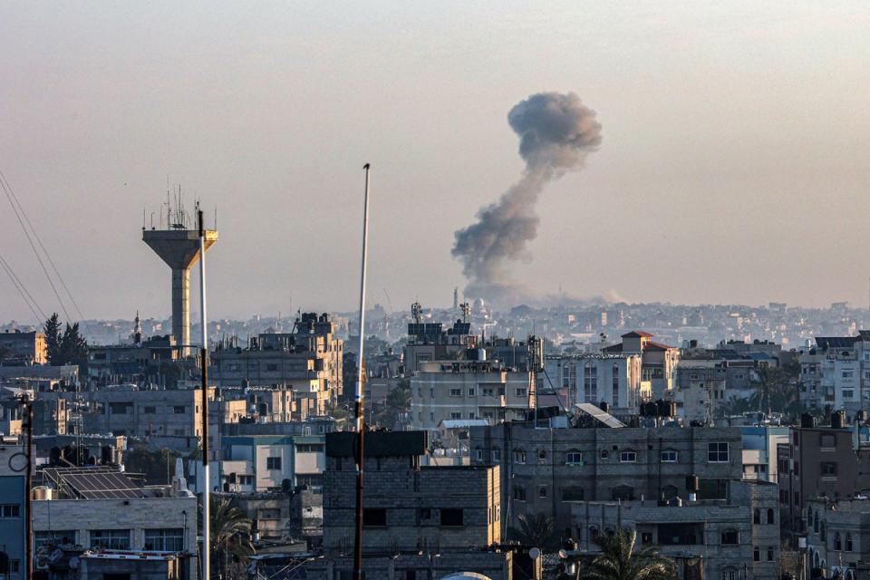 Smoke billowing over Khan Younis in the southern Gaza Strip as Israel carries out airstrikes (AFP via Getty)