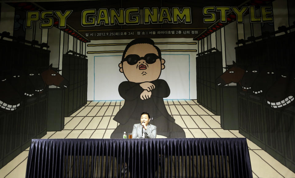 South Korean rapper PSY, who sings the popular "Gangnam Style" song, speaks to the media during a press conference in Seoul, South Korea, Tuesday, Sept. 25, 2012. (AP Photo/Lee Jin-man)