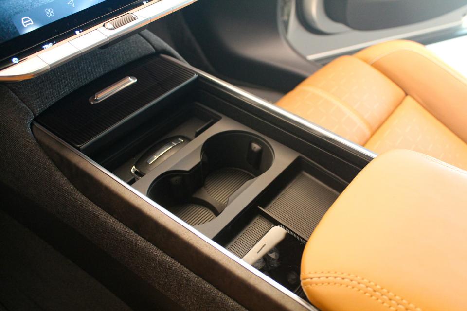 Hidden cup holders and storage in the Lucid Gravity SUV.