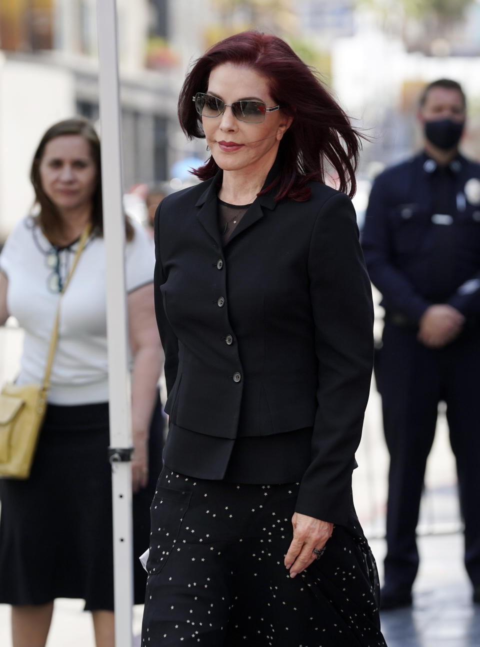 Priscilla Presley appears at a ceremony honoring television producer Nigel Lythgoe with a star on the Hollywood Walk of Fame, Friday, July 9, 2021, in Los Angeles. (AP Photo/Chris Pizzello)