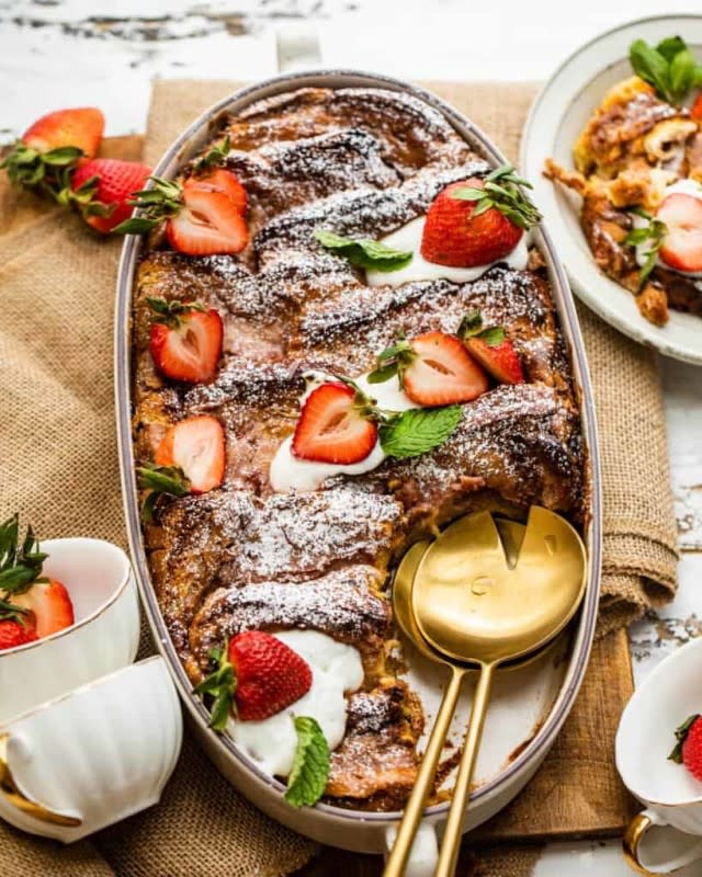 <p>Britney Breaks Bread</p><p>Strawberry French Toast Casserole is a simple yet tasty make-ahead breakfast of buttery stacked french toast, topped cream cheese and strawberry jam, then finished with powdered sugar. Everyone will love this fruity spin on a breakfast classic. </p><p><strong>Get the recipe: <a href="https://britneybreaksbread.com/strawberry-french-toast-casserole/" rel="nofollow noopener" target="_blank" data-ylk="slk:Strawberry French Toast Casserole;elm:context_link;itc:0;sec:content-canvas" class="link ">Strawberry French Toast Casserole</a></strong></p>