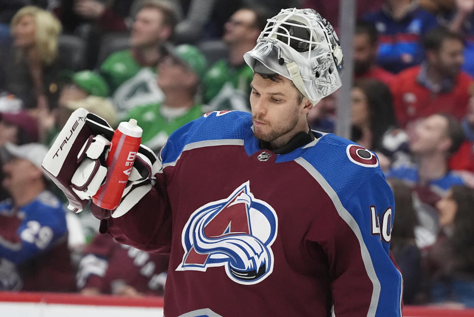 Colorado Avalanche goaltender Alexandar Georgiev waits for play to resume during a timeout in the second period of the team's NHL hockey game against the Detroit Red Wings on Wednesday, March 6, 2024, in Denver. (AP Photo/David Zalubowski)