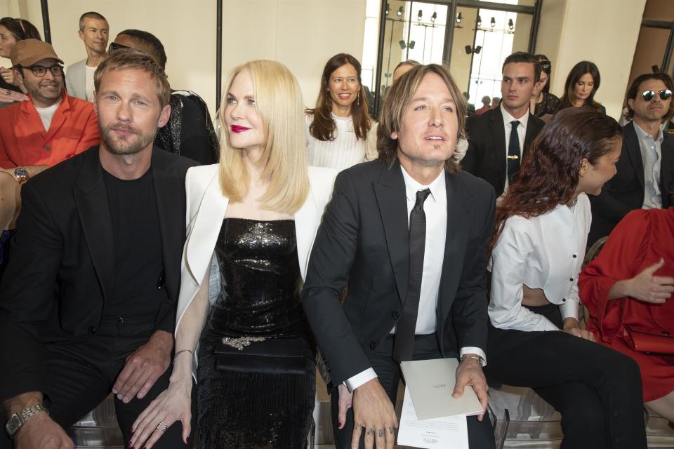 A photo of Nicole Kidman, Alexander Skarsgard and Keith Urban at the Giorgio Armani fashion show in Paris.