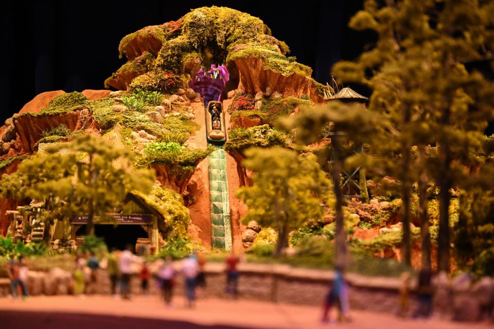 A model of Tiana's Bayou Adventure, which will reimagine Disneyland's Splash Mountain, is displayed during the Walt Disney D23 Expo in 2022