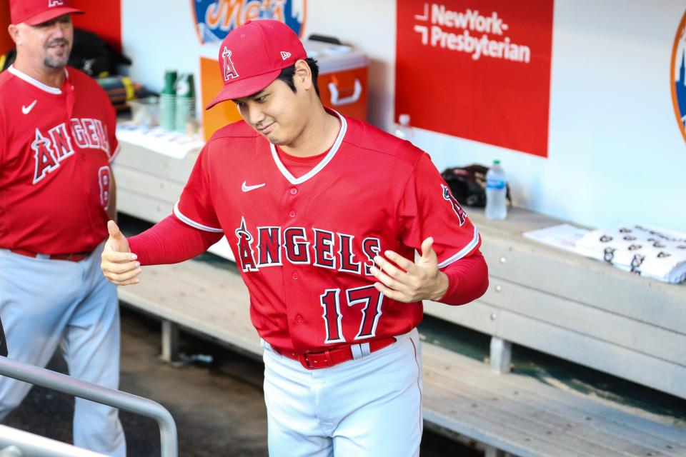Despite a torn ligament in his elbow, Shohei Ohtani continues his role as the Angels' everyday designated hitter. He leads the majors in home runs and is a heavy favorite to win his second AL MVP award this season.