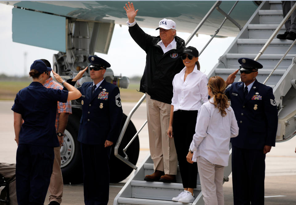 <p>President Donald Trump (C) waves next to first lady Melania Trump upon arrival prior to receiving a briefing on Tropical Storm Harvey relief efforts in Corpus Christi, Texas, U.S., August 29, 2017. (Photo: Carlos Barria/Reuters) </p>