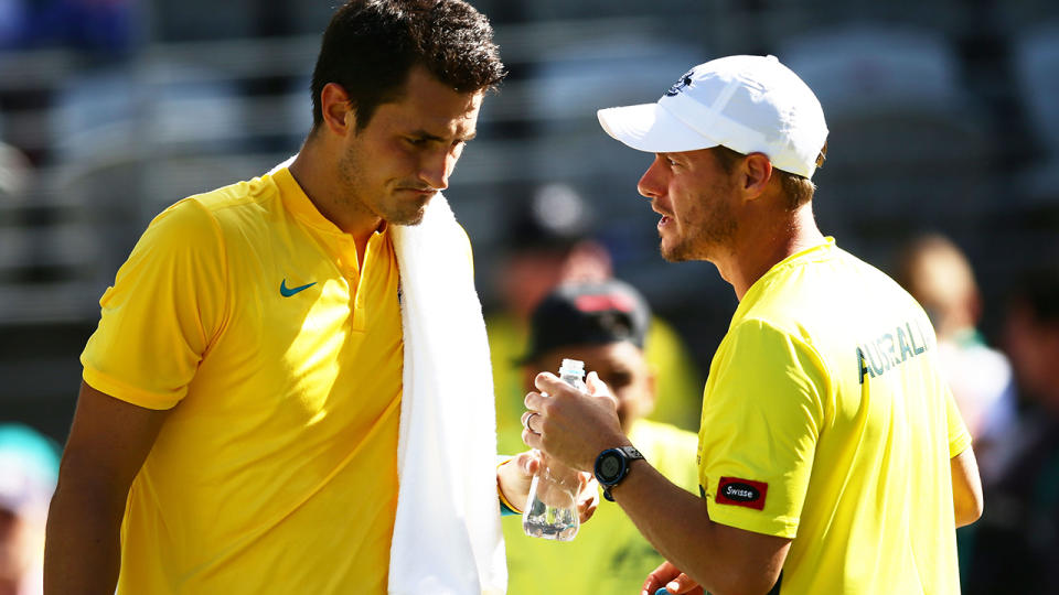 Bernard Tomic and Lleyton Hewitt. (Photo by Matt King/Getty Images)