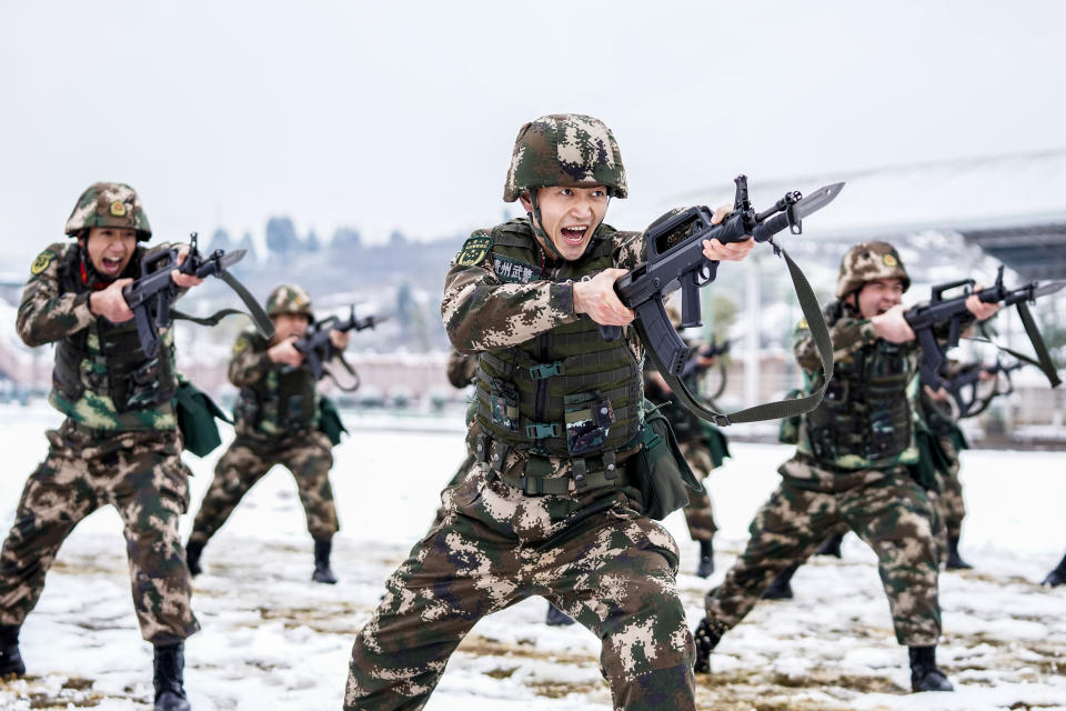 Chinese soldiers train in the snow in Guizhou. 