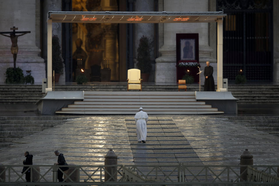 FILE - Pope Francis arrives to deliver the Urbi and Orbi prayer in an empty St. Peter's Square, at the Vatican, on March 27, 2020. Pope Francis' first 10 years as pope have been marked by several historic events, as well as several unplanned moments or comments that nevertheless helped define the contours and priorities of history's first Latin American pope. (AP Photo/Alessandra Tarantino, File)