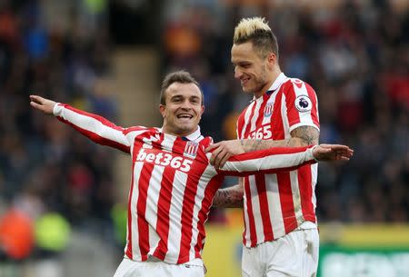 Britain Soccer Football - Hull City v Stoke City - Premier League - The Kingston Communications Stadium - 22/10/16 Stoke City's Xherdan Shaqiri celebrates scoring their second goal with Marko Arnautovic Reuters / Scott Heppell Livepic