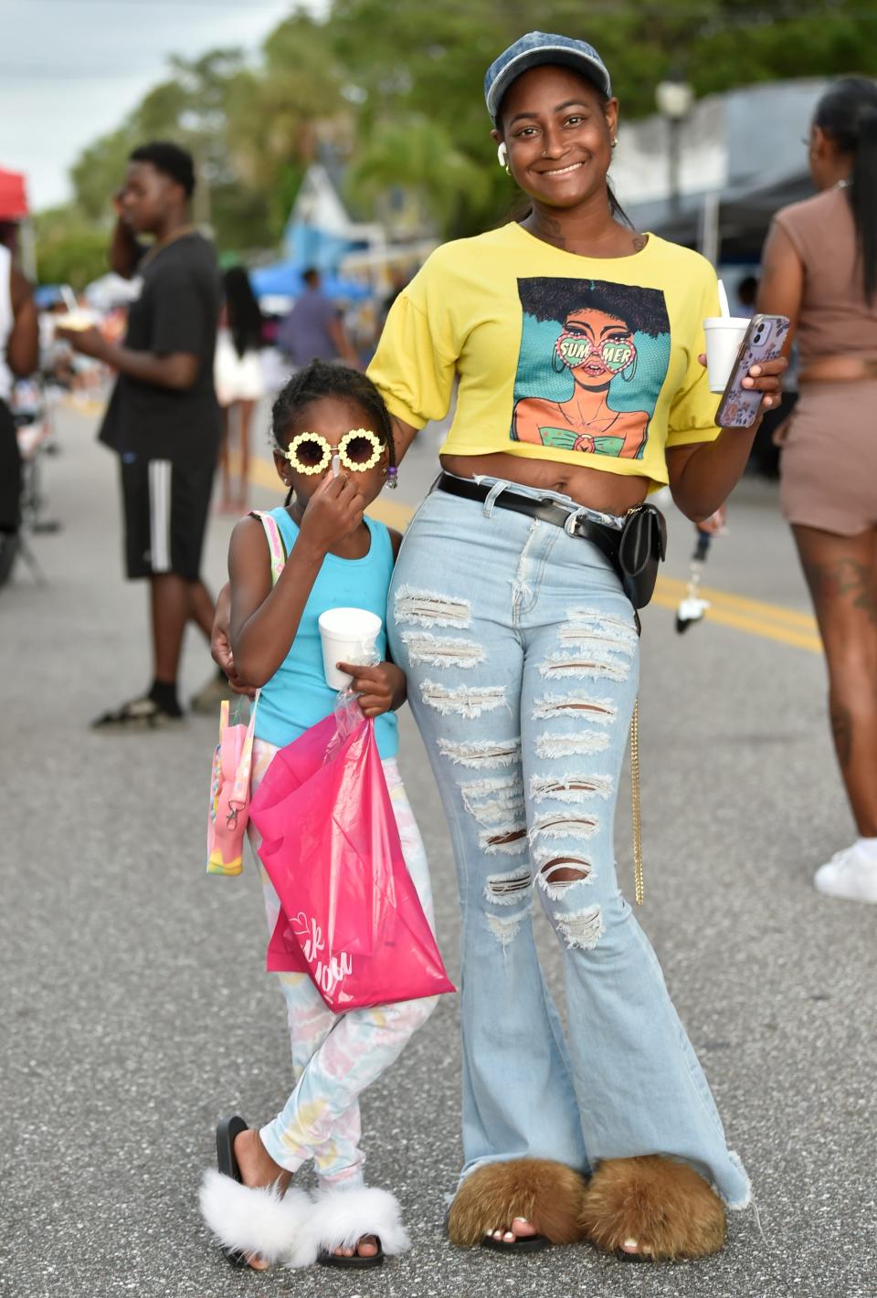 Karimah Sloan and Queen Kay'ce, 6, pose during a Juneteenth Celebration in Sarasota, Florida, on  June 18, 2022, in the heart of Sarasota's historically Black neighborhood of Newtown.