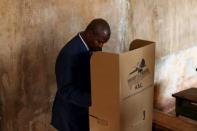 Presidential candidate Faustin-Archange Touadera votes during the second round presidential and legislative elections in Bangui, Central African Republic, February 14, 2016. REUTERS/Siegfried Modola