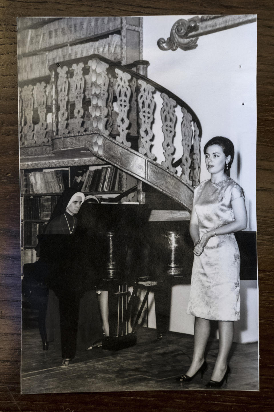 A family album photograph provided courtesy of José Miguel Cruz da Costa shows Hannelore Fischer Cruz singing, in Braga, northern Portugal. Born amid the ruins of wartime Vienna, Hannelore Fischer was sent as a small child to Portugal where her flamboyant manner and outstanding soprano voice would later help her build a life far from her place of birth. She died of COVID-19 on March 25, 2020, after four days on a ventilator at Braga's hospital. (Courtesy of José Miguel Cruz da Costa via AP)