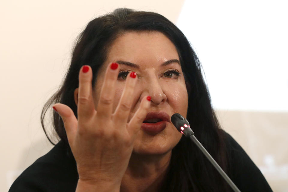 Performance artist Marina Abramovic speaks during the press conference for the art exhibition "Marina Abramovic - The Cleaner" in the Museum of Contemporary Art in Belgrade, Serbia, Saturday, Sept. 21, 2019. Abramovic is displaying her work in her native Belgrade for the first time in 44 years and she says that returning home has been highly emotional. (AP Photo/Darko Vojinovic)