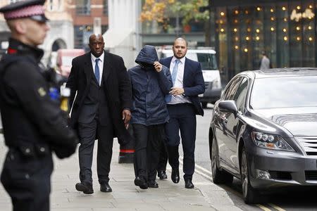 Former undercover reporter for the News of the World and the Sun on Sunday, Mazher Mahmood (C), arrives for sentencing at the Old Bailey in London, Britain October 21, 2016. REUTERS/Stefan Wermuth