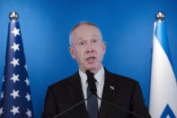 FILE - Israeli Defense Minister Yoav Gallant speaks during a joint statement with his U.S. counterpart, Secretary of Defense Lloyd Austin following their meeting at Ben Gurion International Airport, Thursday, March 9, 2023 in Lod, Israel. Prime Minister Benjamin Netanyahu fired his defense minister, Sunday, March 26, 2023, a day after he called on the Israeli leader to halt a planned judicial overhaul that has fiercely divided the country and prompted growing discontent within the ranks of the military. (AP Photo/Maya Alleruzzo, File)