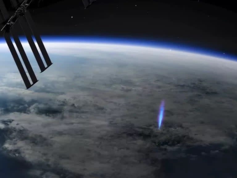 <p>An artist’s visualisation of the blue jet lighting and pulses observed from the International Space Station</p> (ESA)