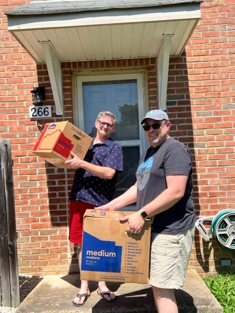 Matthew Hambleton and his husband Kevin Lowrie are all smiles as they move into their new home in suburban Philadelphia. The couple got a second chance to get their home after being outbid a couple of months ago and the original bidder's deal fell through.