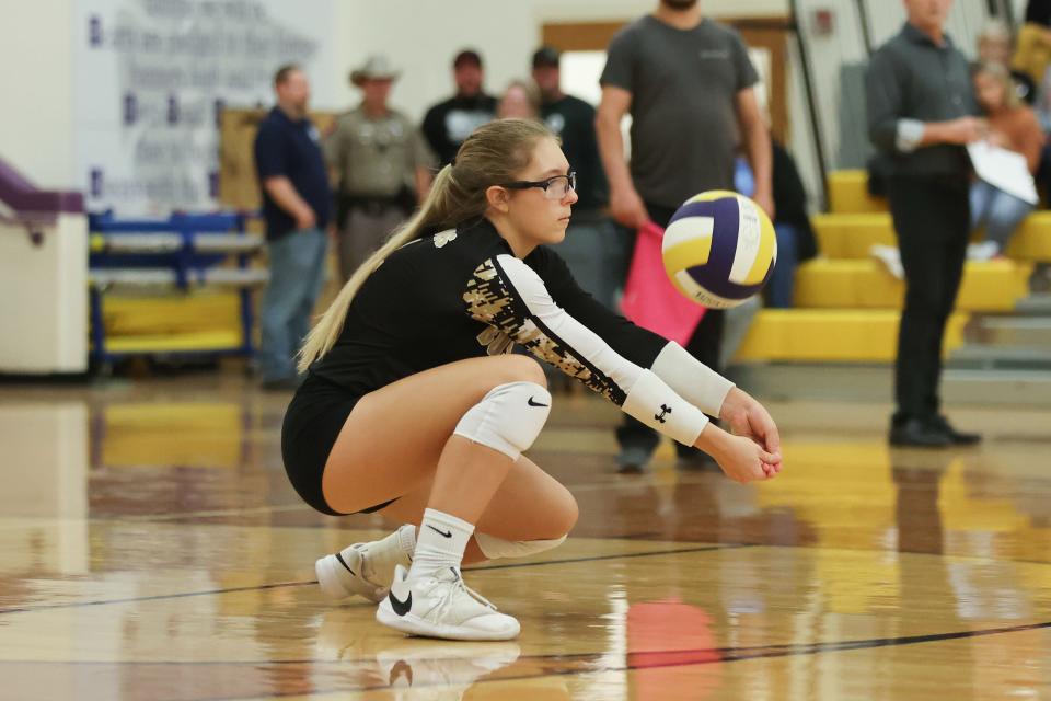 Bushland’s Jada Permenter (4) bumps a ball in a District 1-3A match against River Road, Tuesday, October 25, 2022, at River Road High School.  Bushland won 3-0